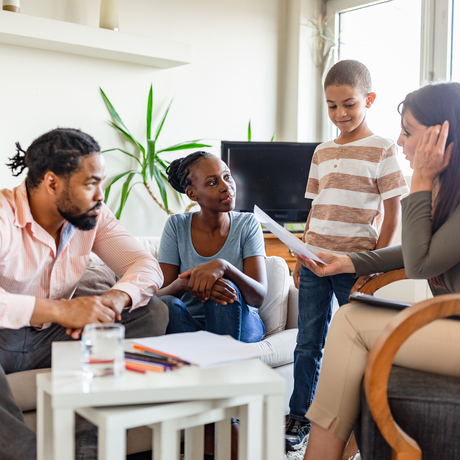 Family at a mental health therapy session.